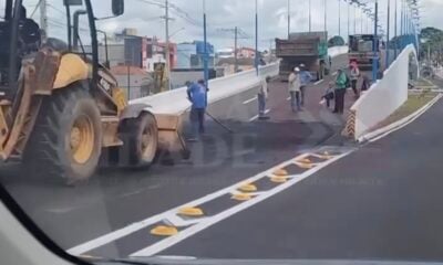 Homens jogam massa asfáltica em Elevado da Dias Martins 24 horas após inauguração