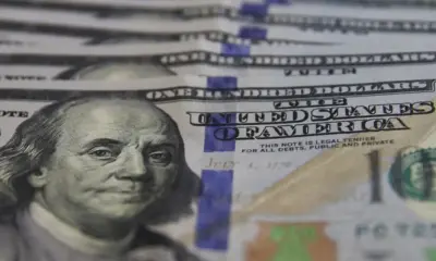 Dólar inicia mês em baixa com chances de negociação entre EUA e China