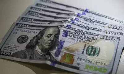 Dólar cai para R$ 5,66 após suspensão de tarifas de Trump