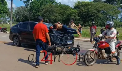 Motociclista vai parar no capô de carro ao tentar cruzar via em Senador Guiomard