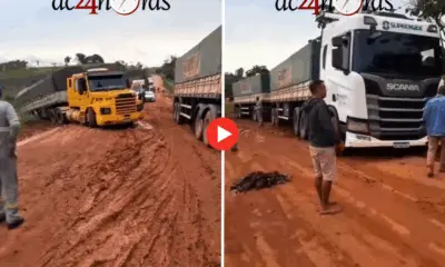 Buracos tapados com barro na BR-317 atola carretas e ônibus entre Assis Brasil e Brasiléia