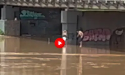 ac24horas flagra jovem saltando de ponte durante cheia do Rio Acre