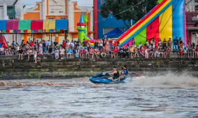 Transbordamento do Rio Acre faz da Gameleira ponto de encontro de populares e circulação de jet skis